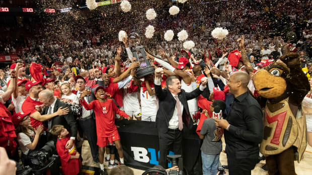 Mar 8, 2020; College Park, Maryland, USA; Maryland Terrapins head coach Mark Turgeon celebrates with his team after winning the Big Ten mens basketball regular season championship after defeating against the Michigan Wolverines at XFINITY Center. Mandatory Credit: Tommy Gilligan-USA TODAY Sports